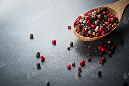 Preview: Peppercorns on a dark background
