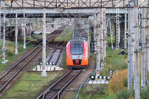 Preview: Top view of modern intercity high speed train under the bridge. Commercial transportation.