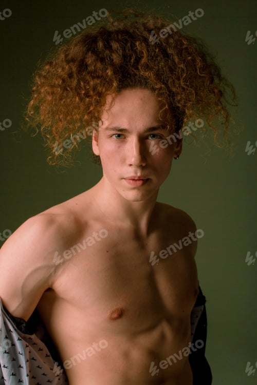 Preview: Attractive And Stylish Guy With Curly Hair And A Sports Figure