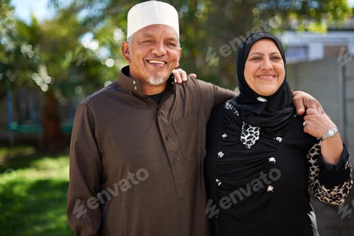 Preview: Living life with love. Portrait of a smiling senior muslim couple outside.