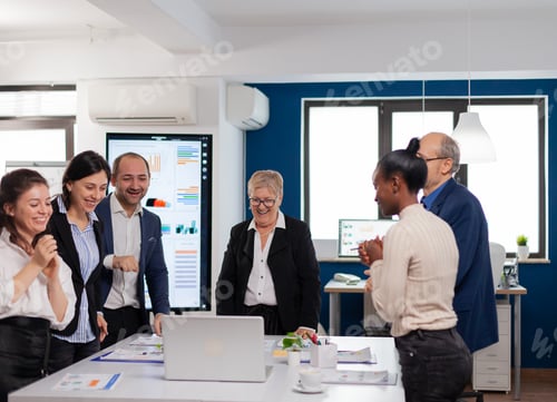Preview: Financial corporate team overjoyed in conference room