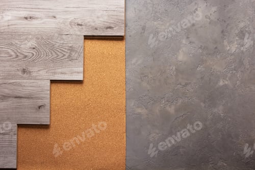 Preview: Laminate wood floor at cork background texture. Wooden laminate floor and corkboard on cemen