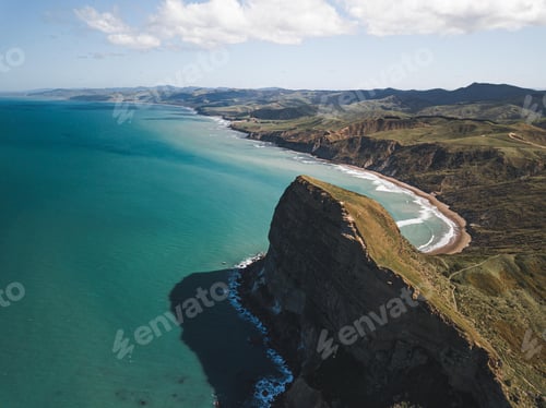 Preview: Beautiful view of turquoise water and rocky shoreline. Castlepoint, Wairarapa, New Zealand.