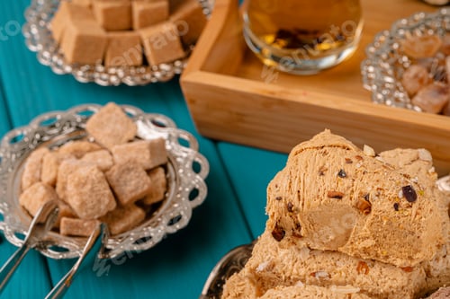Preview: Turkish halva national dessert on blue wooden table
