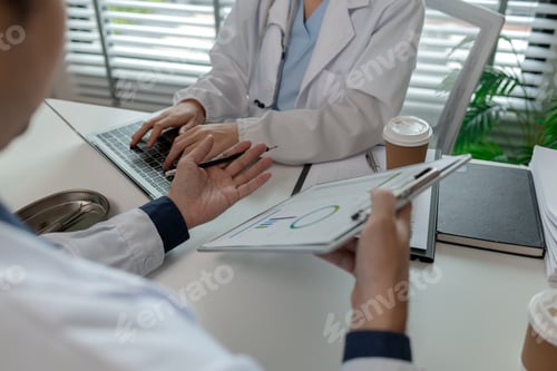 Preview: two doctors sat in a private office at the hospital discussing and exchanging knowledge with each ot