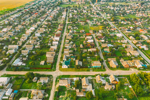 Preview: Aerial View Of Town Village Cityscape Skyline In Summer Day. Residential District, Houses And Garden