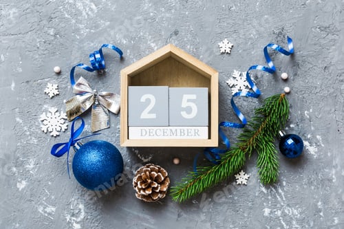 Preview: Christmas calendar 25 december. Christmas gift, fir branches, pine cones. Flat lay