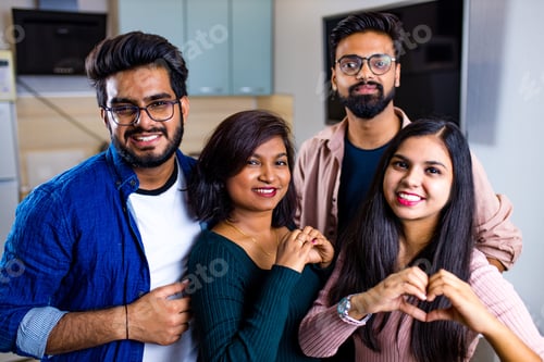 Preview: Multiracial best friends millennials at home kitchen
