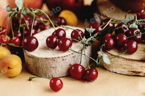 Preview: delicious cherry and fruits on wooden background, rustic summer concept, colorful wallpaper