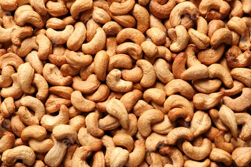 Preview: Tasty cashew nuts as background, top view