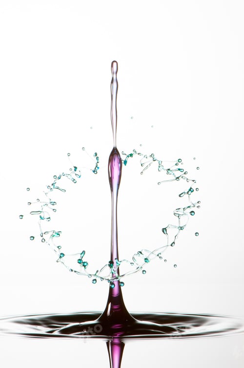 Preview: Splash of colorful liquid with high speed flash
