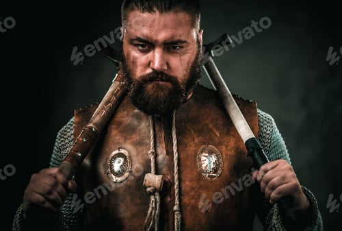 Preview: Viking with cold weapon in a traditional warrior clothes
