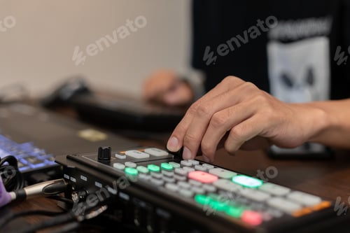 Preview: Close up a hand working of switch controller handle video of broadcast. Live digital streaming.