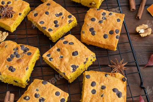 Preview: Pumpkin blondie or cake with chocolate drops, walnuts, cinnamon and anise. Dessert for Thanksgiving
