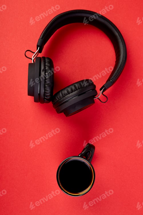 Preview: Black Headphones and cup of coffee