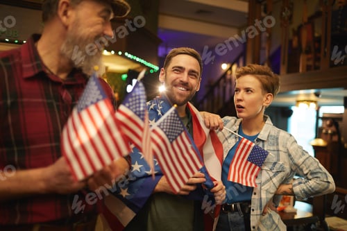 Preview: People with American flags in the bar