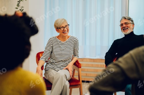Preview: Senior woman talking about her mental health on a group therapy session