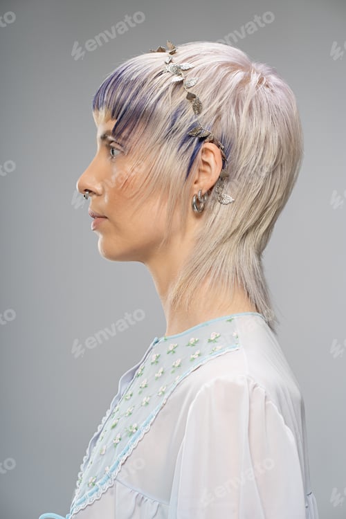Preview: Side Profile Portrait of Woman with Septum Piercing and Floral Top - Modern and Stylish