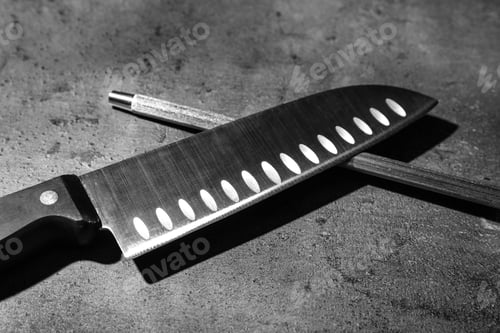 Preview: Santoku knife and sharpener on grey background