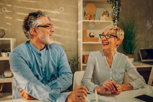 Preview: Smiling Couple Shares a Laugh in Home
