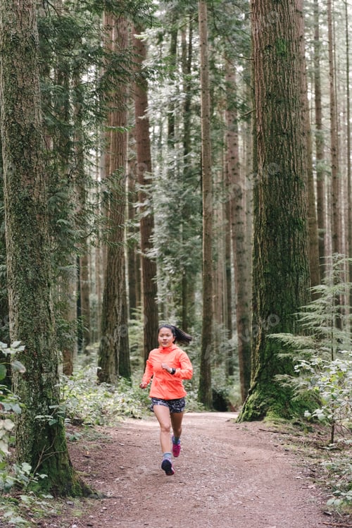 Preview: Woman running in forest, Vancouver, Canada