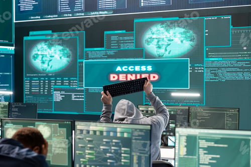 Preview: Displeased irritated team of hackers with denied access message on a big screen