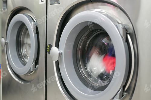 Preview: close up of cloths in a washing machine.