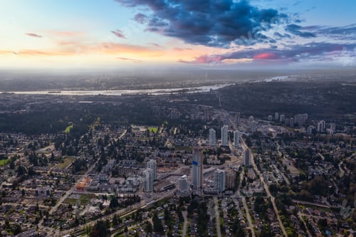 Preview: Aerial view of a modern cityscape during a sunny summer morning