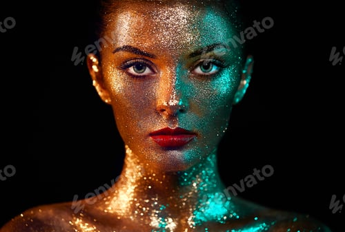 Preview: Portrait of beautiful woman with sparkles on her face