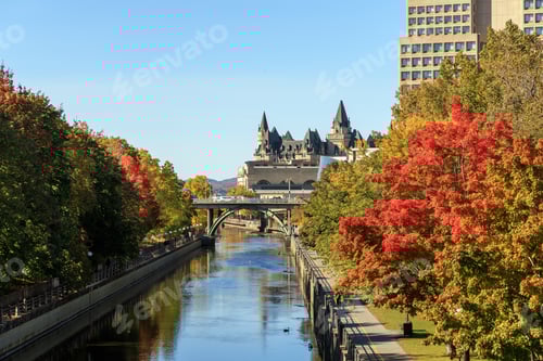 Preview: Rideau Canal in Ottawa, Canada during the autumn season with fall trees.