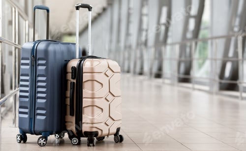 Preview: Travel Fashion. Closeup Of Two Plastic Suitcases Standing At Empty Airport Corridor