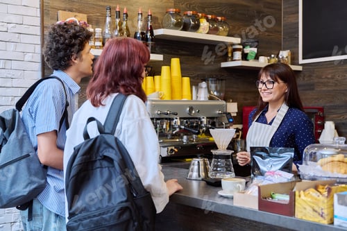 Preview: Customers of coffee shop making an order, talking to female barista cafe worker