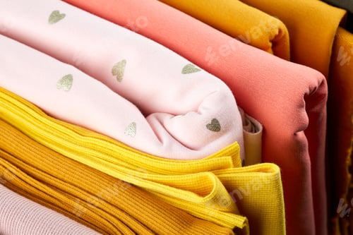 Preview: Colorful Fabric Swatches On Shopfront. A Lot Of Fabric Rolls. Textile Samples Background. Jaws Of