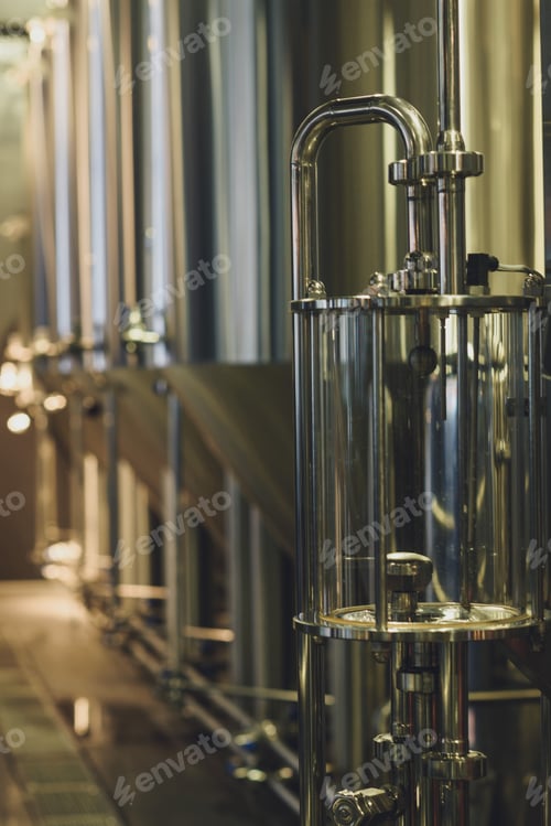 Preview: Modern brewery equipment with stainless tanks for the fermentation beer