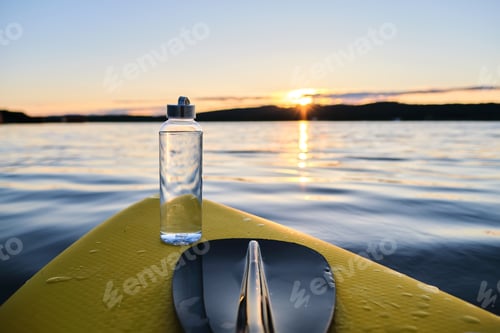 Preview: Clean water bottle on a paddle board.