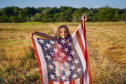 Preview: Happy little girl patriot running in the field with American flag. USA celebrate 4th of July