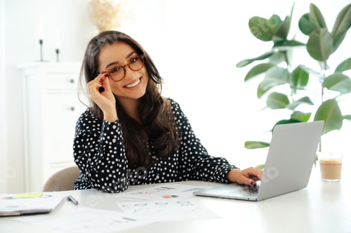 Preview: Beautiful brunette businesswoman with glasses, dressed in a shirt, company manager or designer