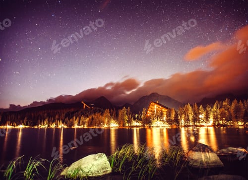Preview: Starry sky over the lake in National Park High Tatras.