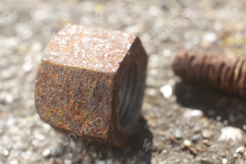 Preview: Selective focus shot of a rusty nut
