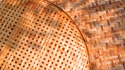 Preview: Two bamboo threshing baskets texture background with sunlight and shadow on surface, top view