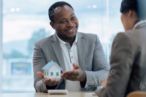 Preview: Real Estate Agent and client talking about Property insurance and security concept about house to