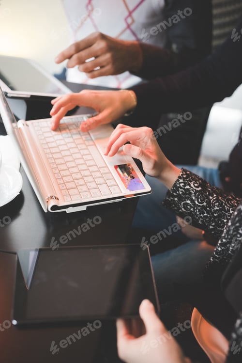 Preview: Close up of business people using technological devices