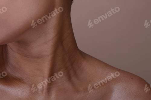 Preview: Close-up of a person's neck and collarbone