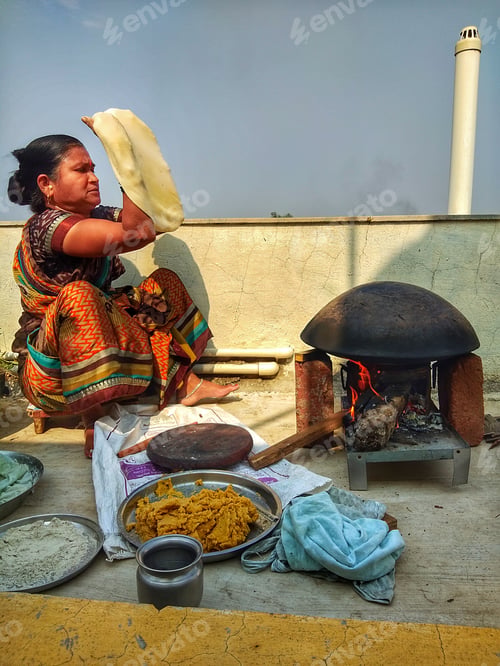 Preview: An Indian Lady making puran poli