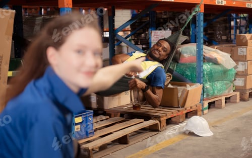Preview: Portrait of happy mature African American man working in warehouse.