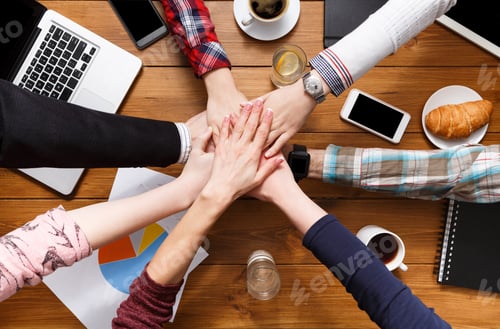 Preview: Teamwork and teambuilding concept in office, people connect hands