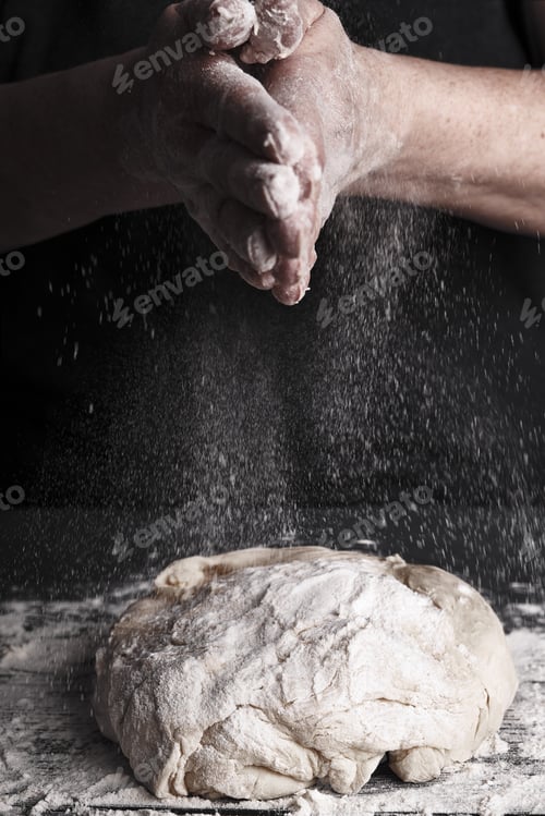 Preview: Cooking dough by elderly woman cook hands for homemade pastry bread, pizza, pasta recipe preparation