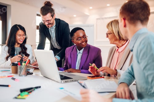 Preview: Multiracial business group of people having a meeting in an office
