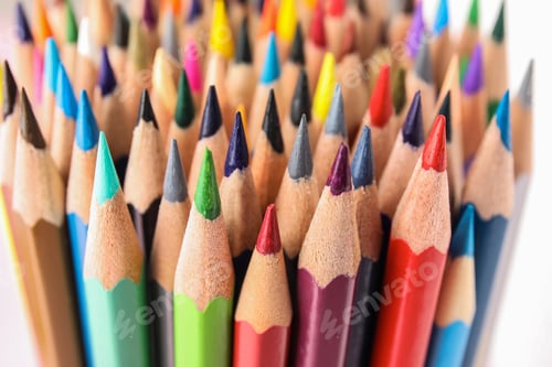 Preview: Different color pencils on white background, closeup view
