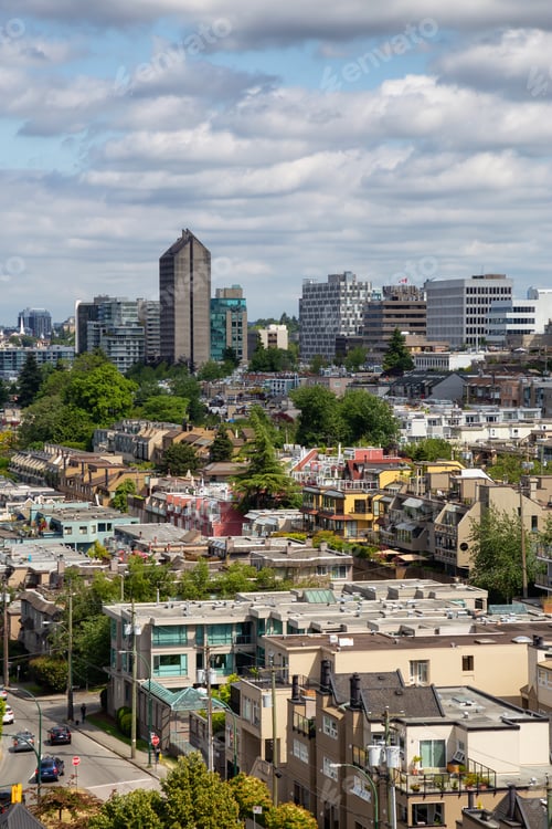 Preview: Aerial view of the modern city during a cloudy summer day